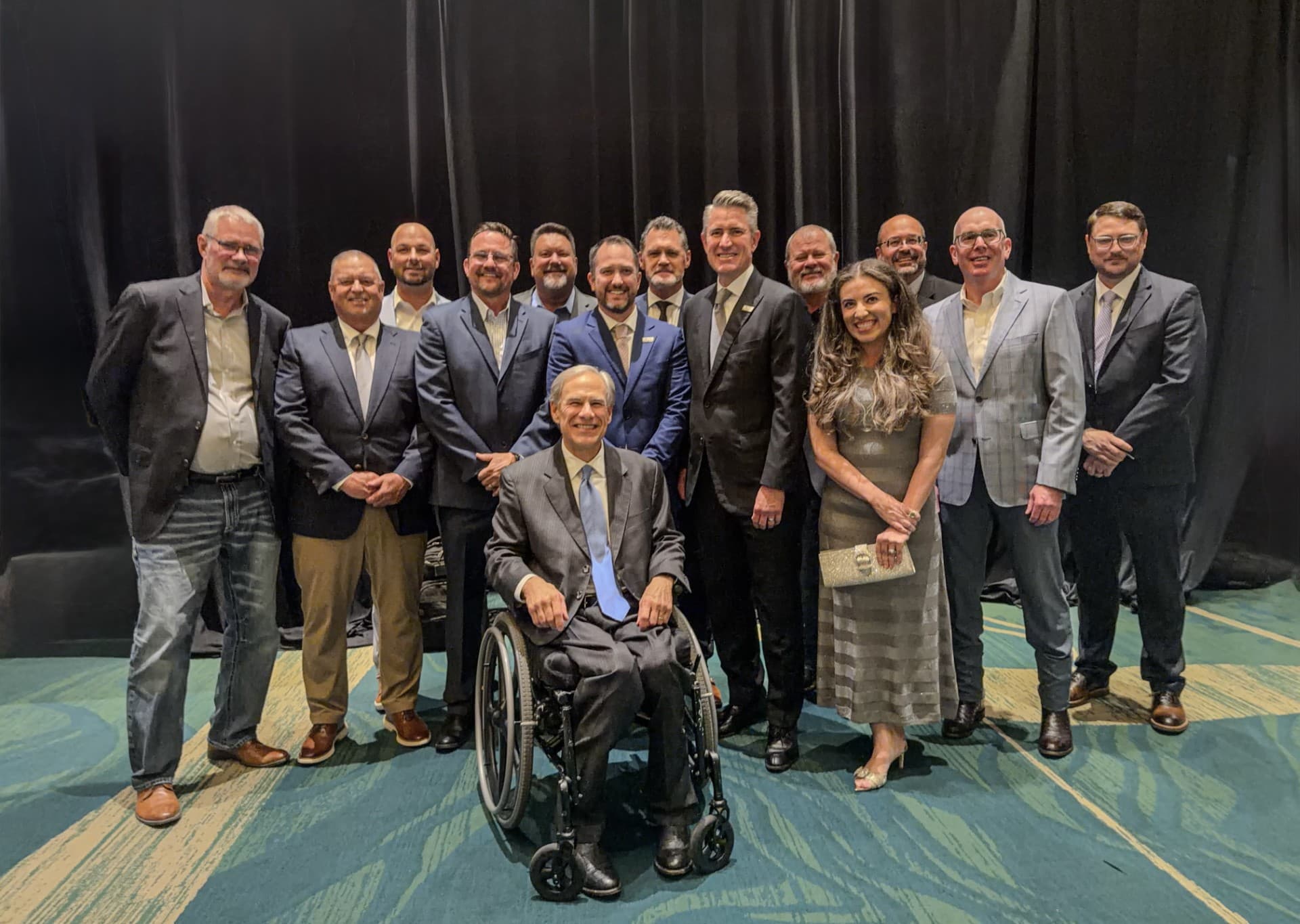 Gov. Greg Abbott with TACA President Andrew Pinkerton and TACA members at the CIM Scholarship Gala