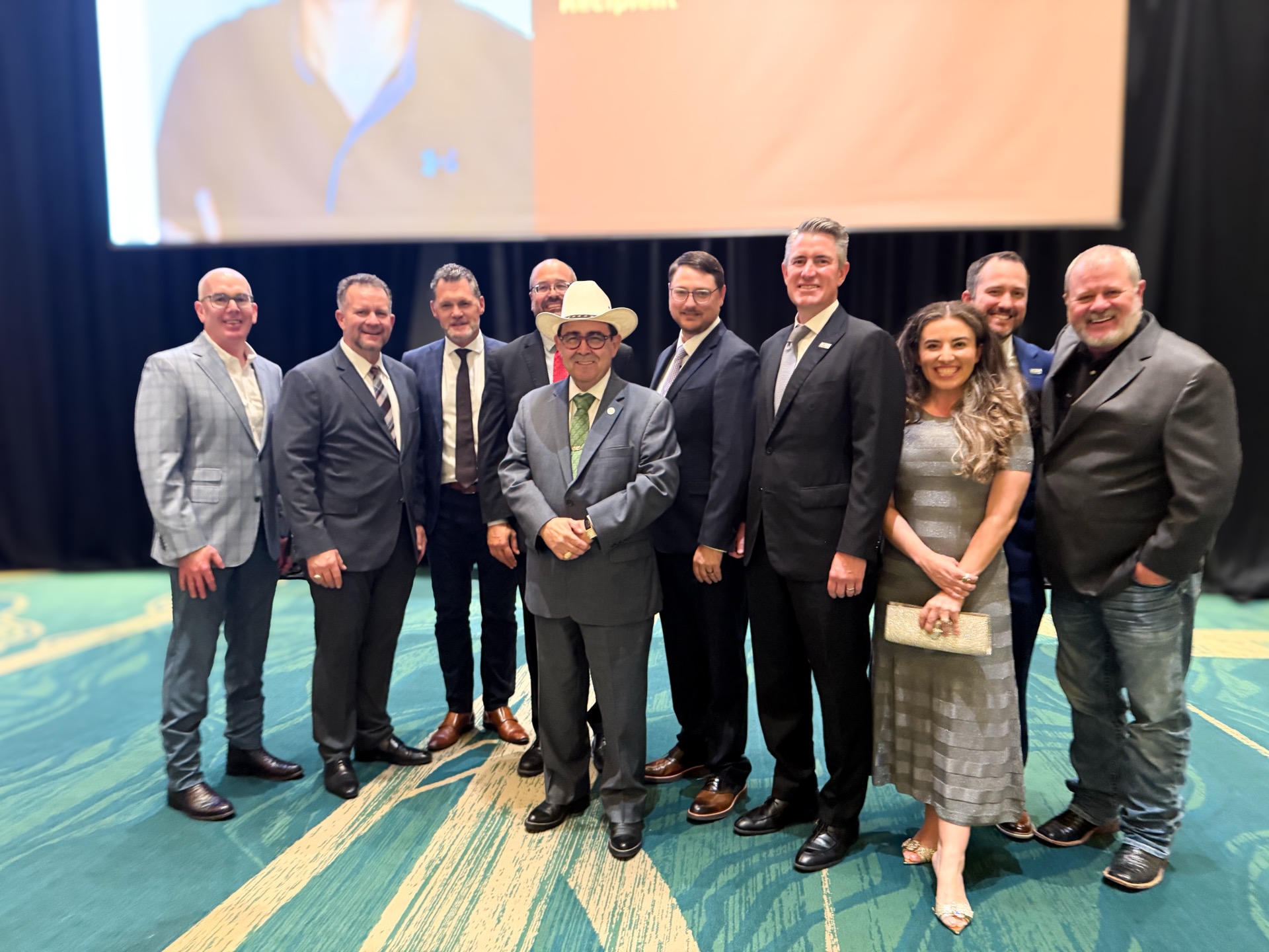 Texas State Sen. Pete Flores with TACA President Andrew Pinkerton and TACA members at the CIM Scholarship Gala
