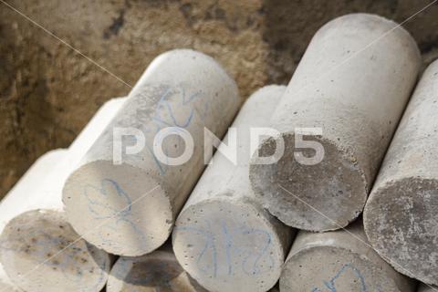 A construction materials lab technician testing samples