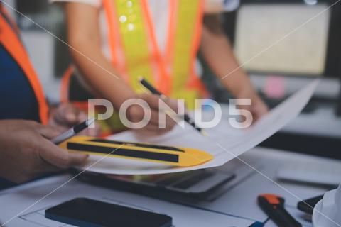 A civil engineer reviewing plans