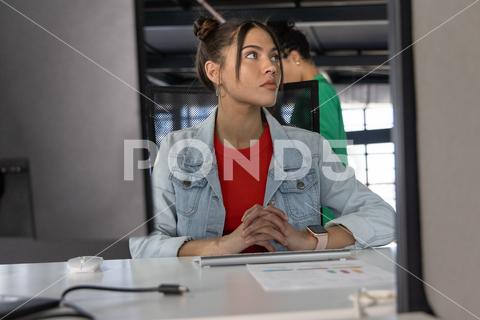 An industry support professional working in an office